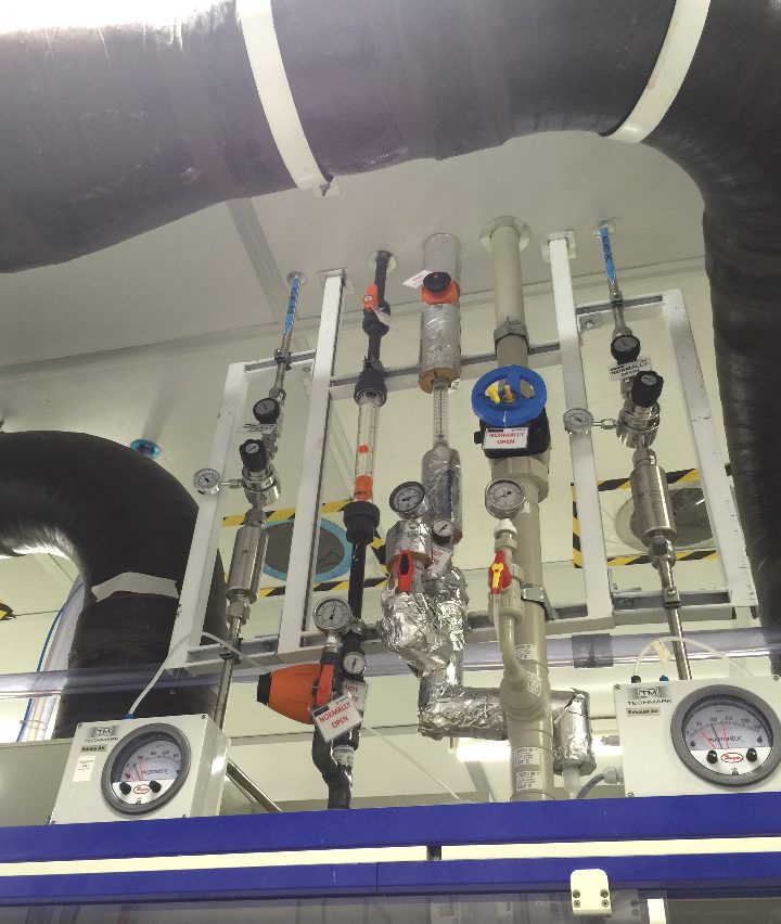 Labeled chemical-service piping and supports