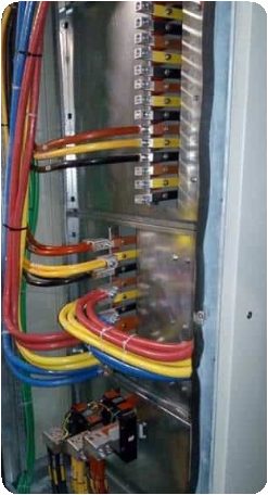 Labeled conductors terminated inside an electrical panel
